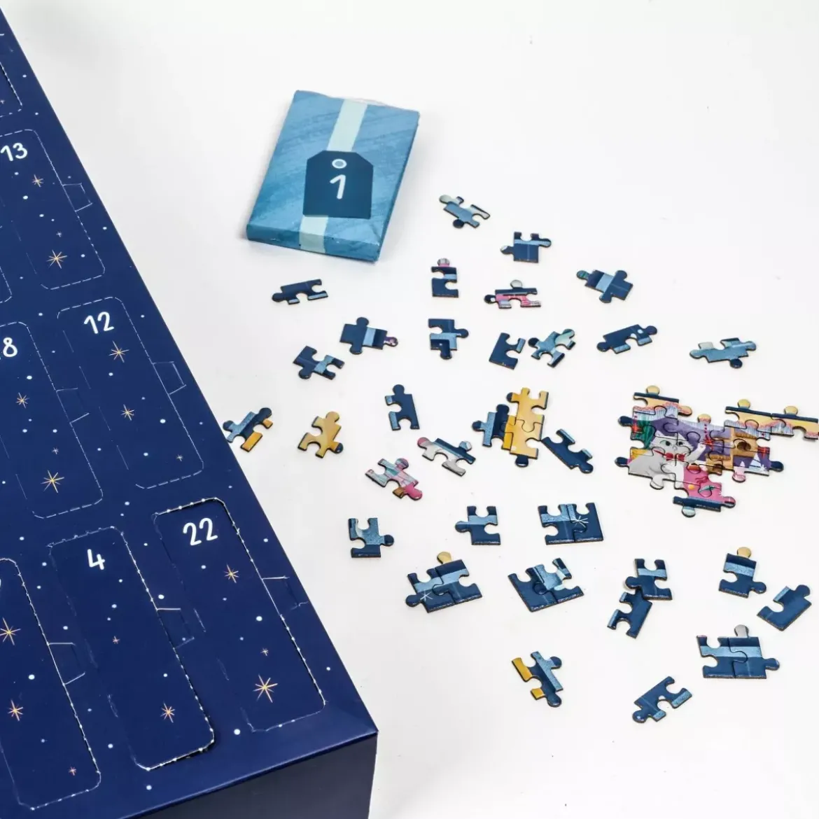 Puzzle Calendrier de l'Avent - Christmas through the Window - 24 x 50 pièces